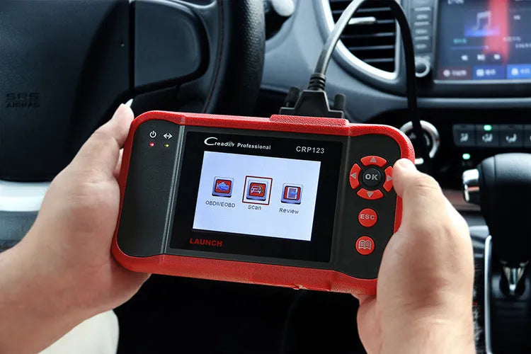 CRP123 handheld automotive diagnostic scanner with cables and accessories for vehicle fault code reading