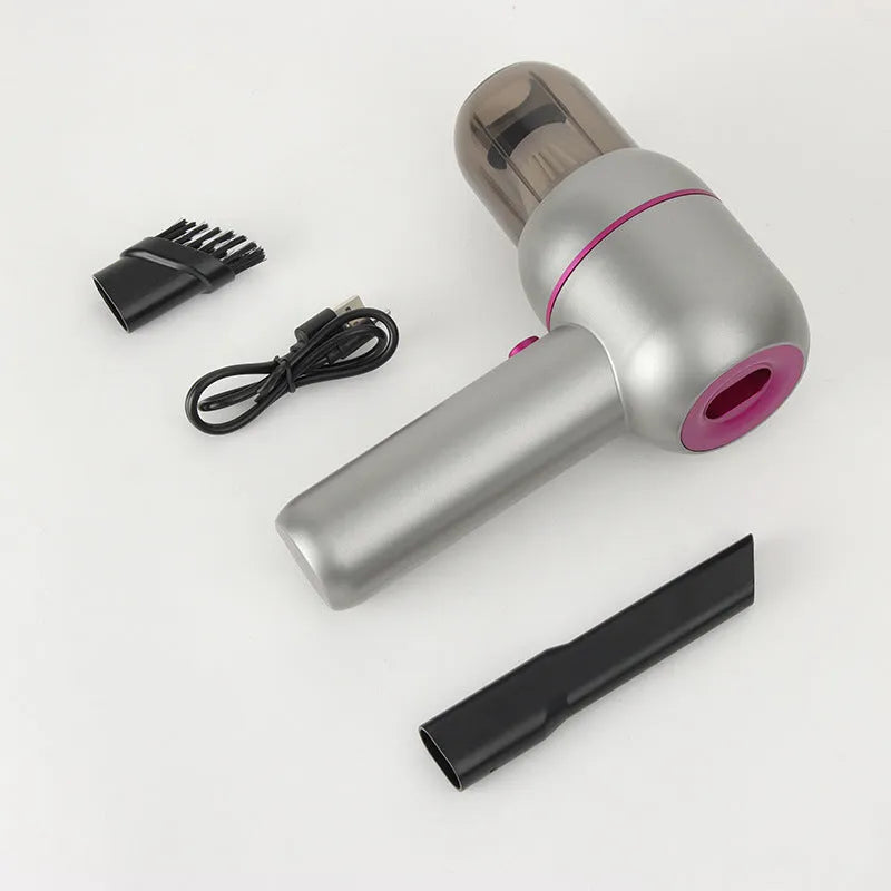 Grey handheld portable car vacuum cleaner with rechargeable battery and included nozzles