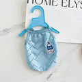 Blue mesh dog cooling vest with adjustable straps on a model dog.