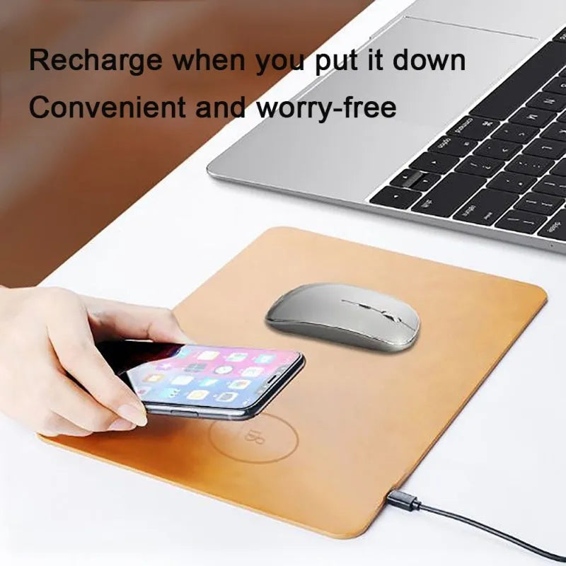Brown leather-textured wireless charging mouse pad with a smartphone placed on it, showing a Micro USB port on the side.