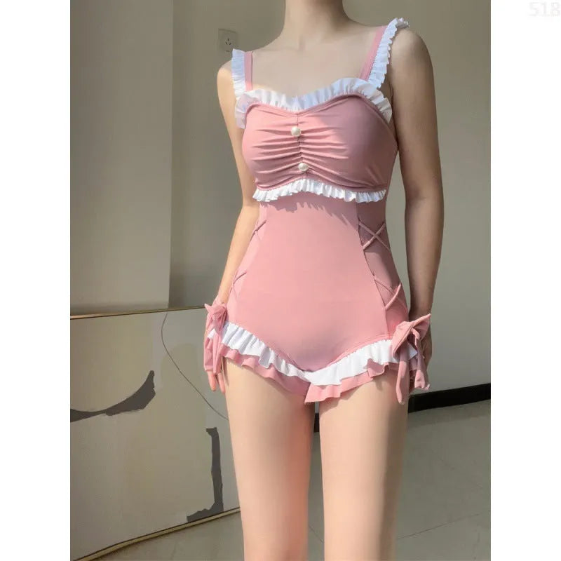 Women's solid colour milk silk one-piece swimsuit in pink or blue with sleeveless design