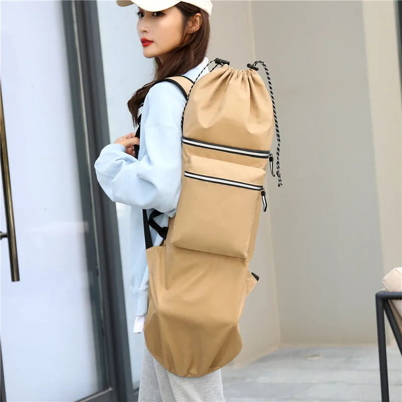Black waterproof nylon skateboard bag holding a longboard, with yoga mat and fishing rod alternative uses shown.
