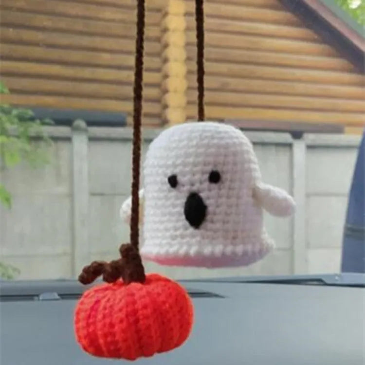 Plush hand-woven car hanging ornament in a cartoon design, made from soft polyester fabric.