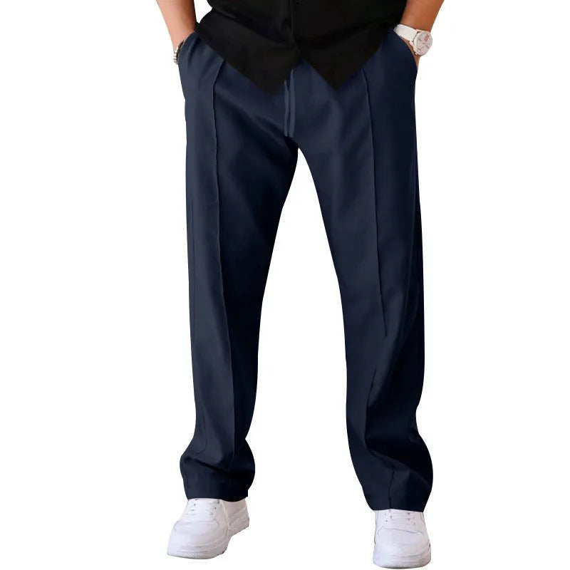 Men's loose straight trousers in waffle polyester with drawstring, available in multiple colours including black and light grey