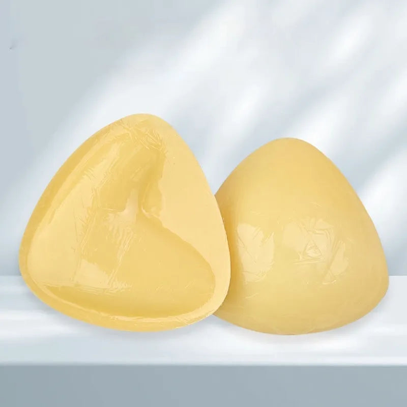 Double sided adhesive silicone bra inserts for push up lift in nude shades, reusable and water resistant