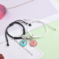Magnetic couple bracelet pair in alloy with electroplated finish showing I love you design and crown style options