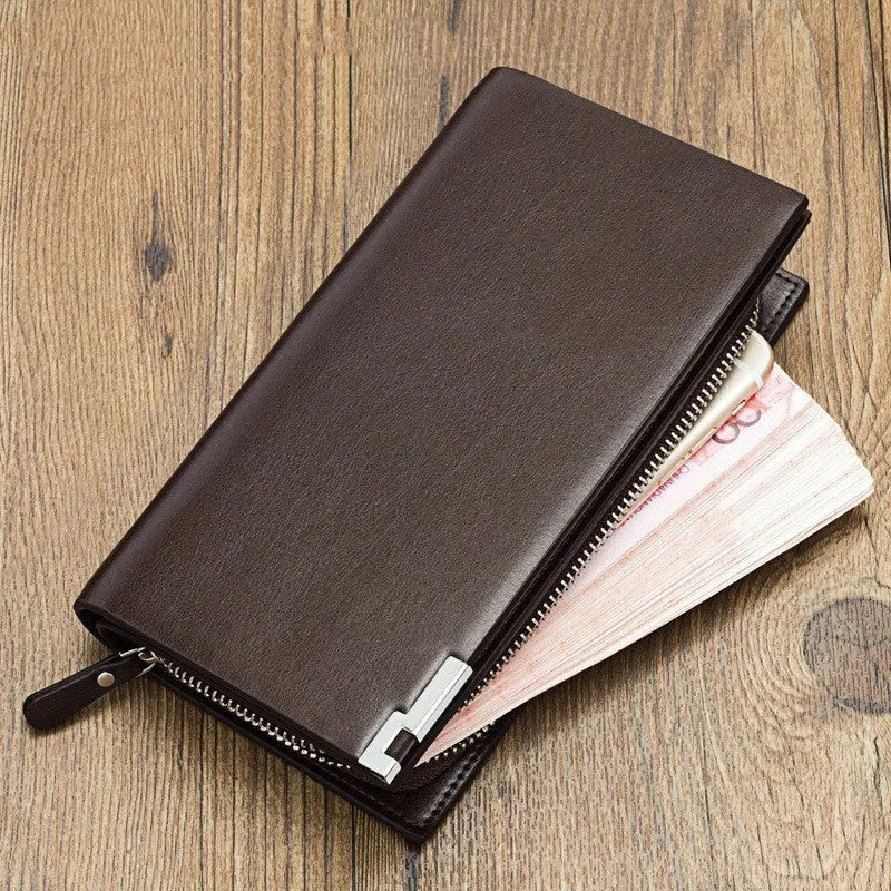 Men's long black PU leather wallet with a silver zipper closure laid flat
