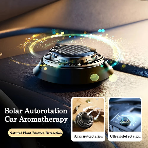 Solar-powered kinetic double-ring car air freshener diffuser in black plastic.