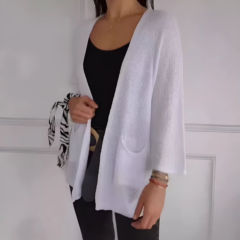 Women's waffle-textured cardigan coat in army green with nine-quarter sleeves and pockets.
