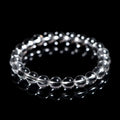 Natural old mine white crystal round bead bracelet with geometric style on a wrist.