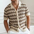 Yellow short-sleeve Tencel sweater with hollow jacquard corrugated texture on a hanger.