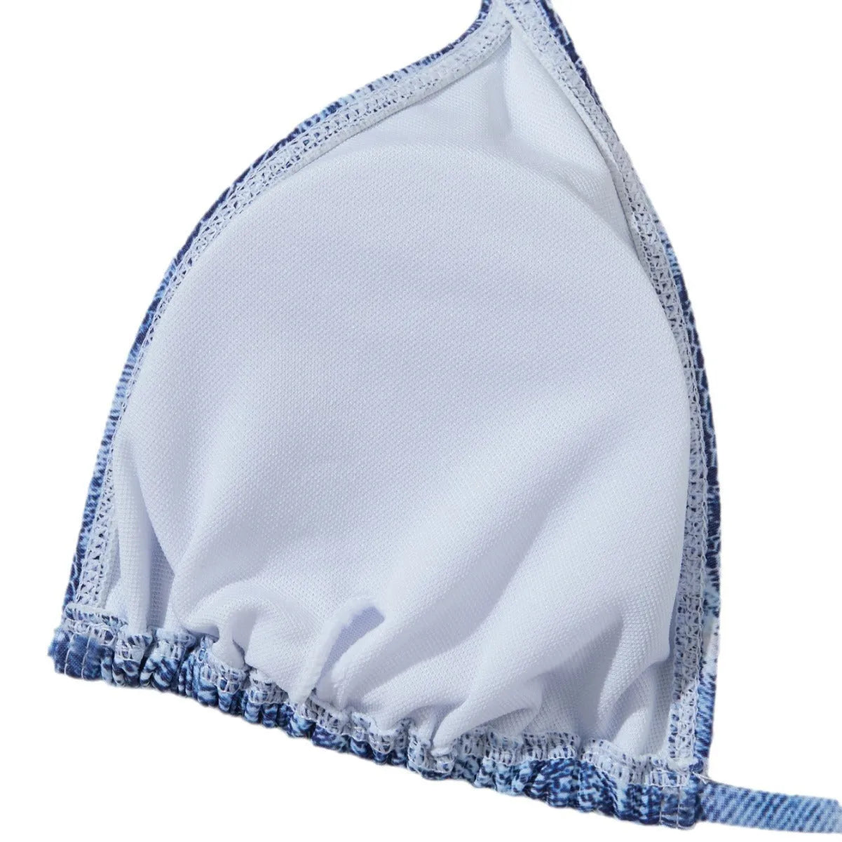 Denim blue printed women's bikini set with strap design on a mannequin.