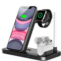 Black foldable 4-in-1 wireless charging stand showing iPhone charging vertically and Apple Pencil on its charging spot.