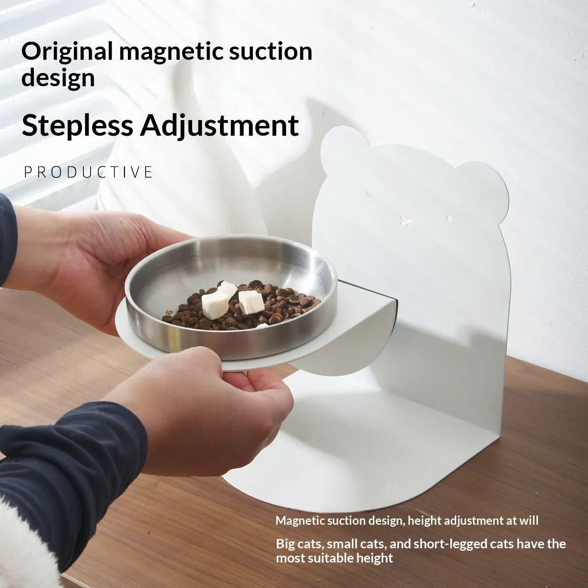 Inclined stainless steel cat feeding bowl on black magnetic stand with bear design