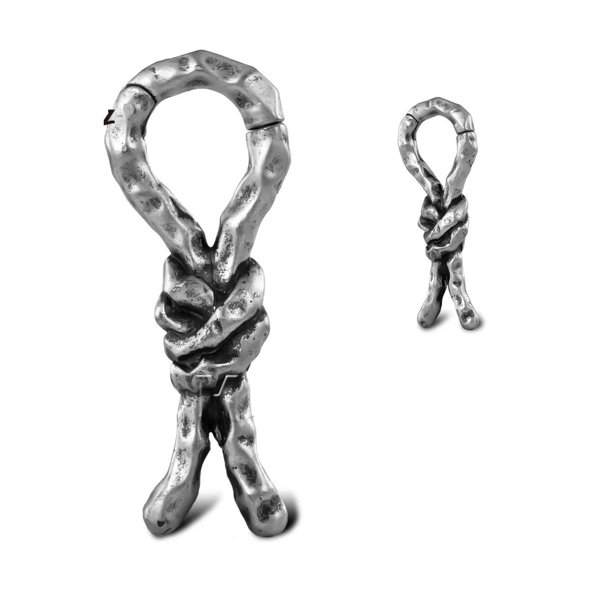 Close-up of Creative Bends And Hitches copper cartilage earrings with a 4mm gauge and retro bending design.