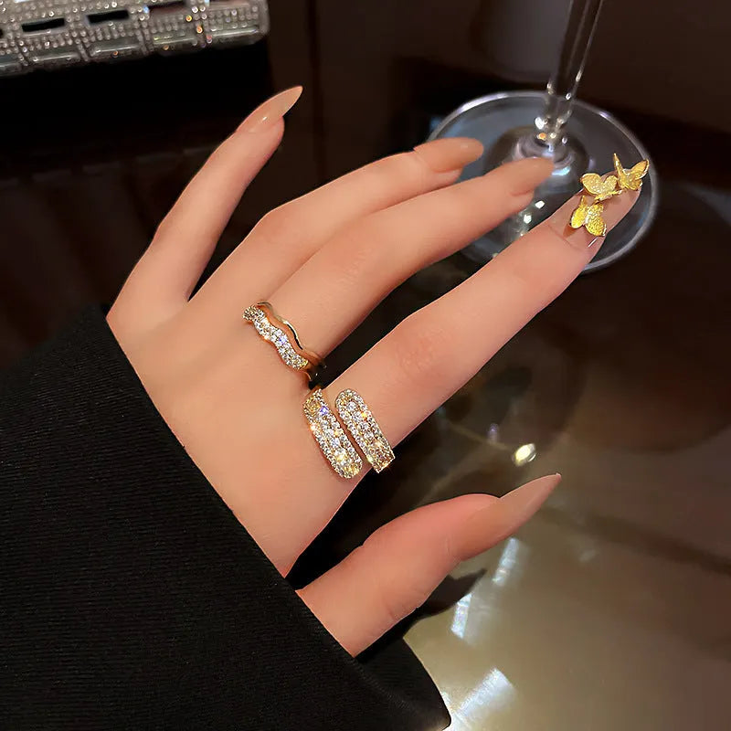 Gold electroplated diamond-embedded open ring for women with geometric alloy band