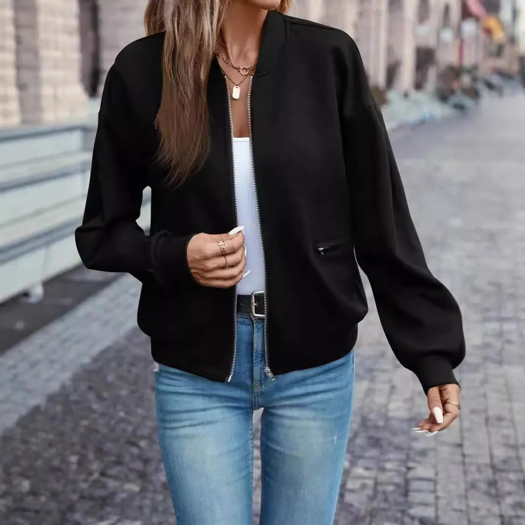 Women's black casual zip jacket with long sleeves and faux pockets