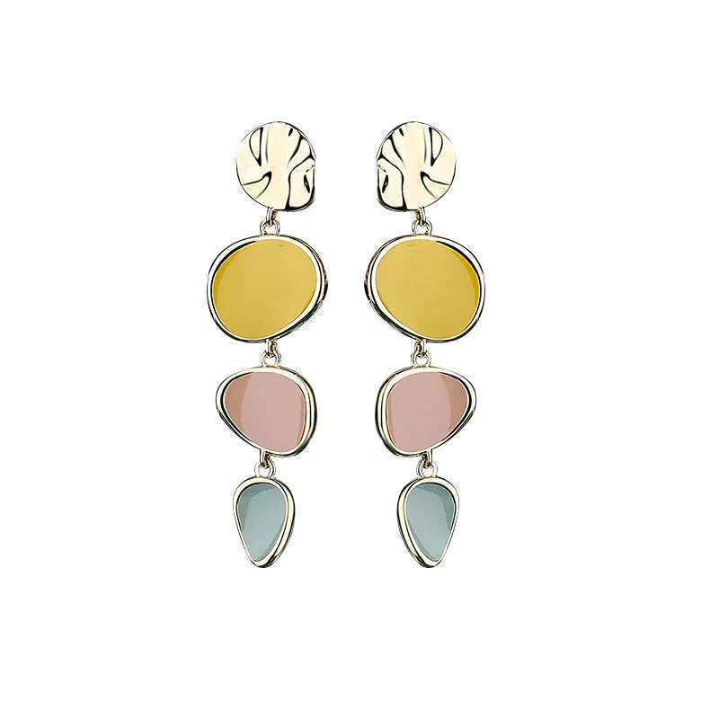 Sterling silver alloy Morandi three-colour oil drip simple wafer disc earrings on a white background.