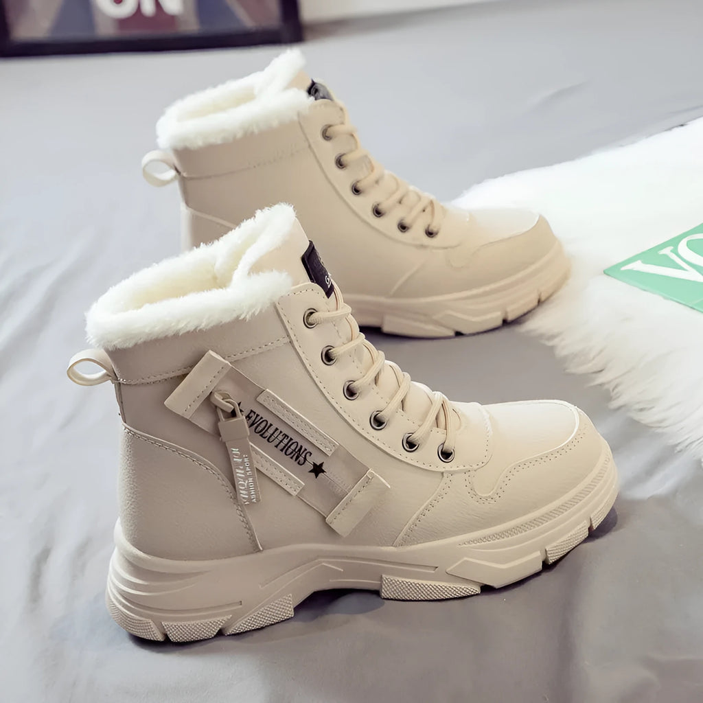 Plus size women's lace-up snow boots with fleece lining and a rubber sole.