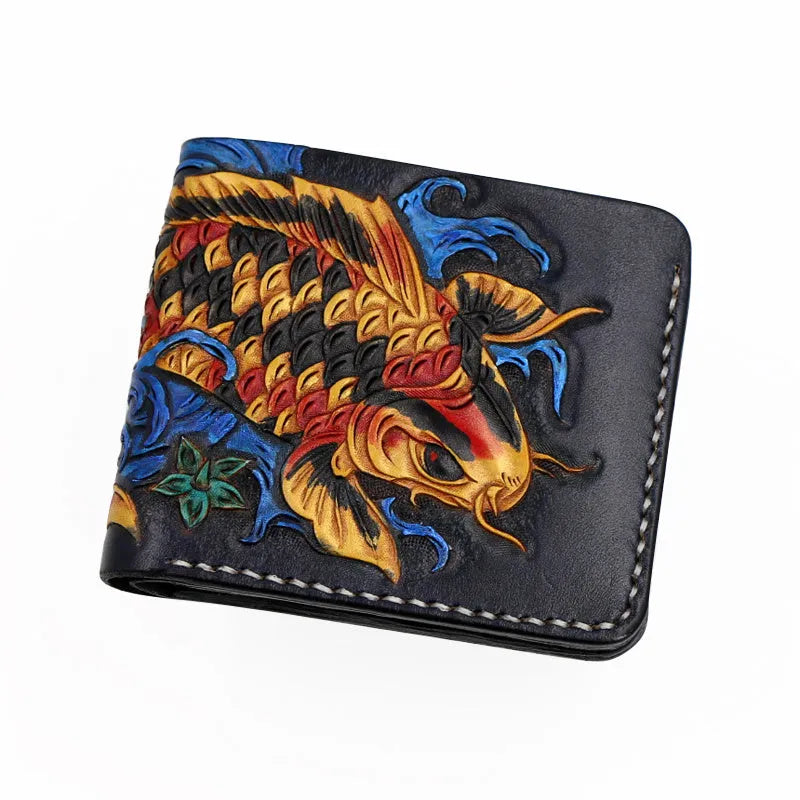 Hand-carved men's leather wallet in navy blue, showing slim profile and open design on a wooden table.