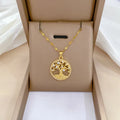 Gold plated adjustable necklace with mother-of-pearl cross pendant set with sparkling zircon stones on a lip chain.