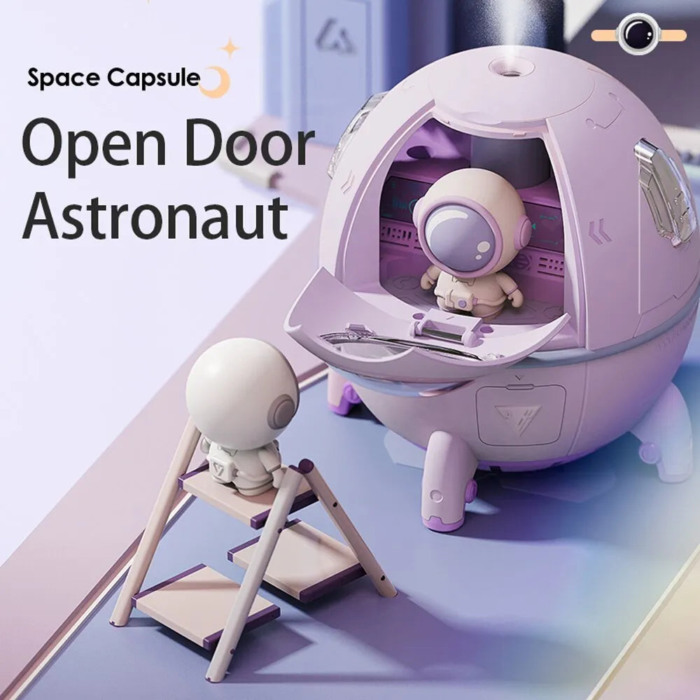 Purple astronaut-shaped USB desktop humidifier with colourful LED light on