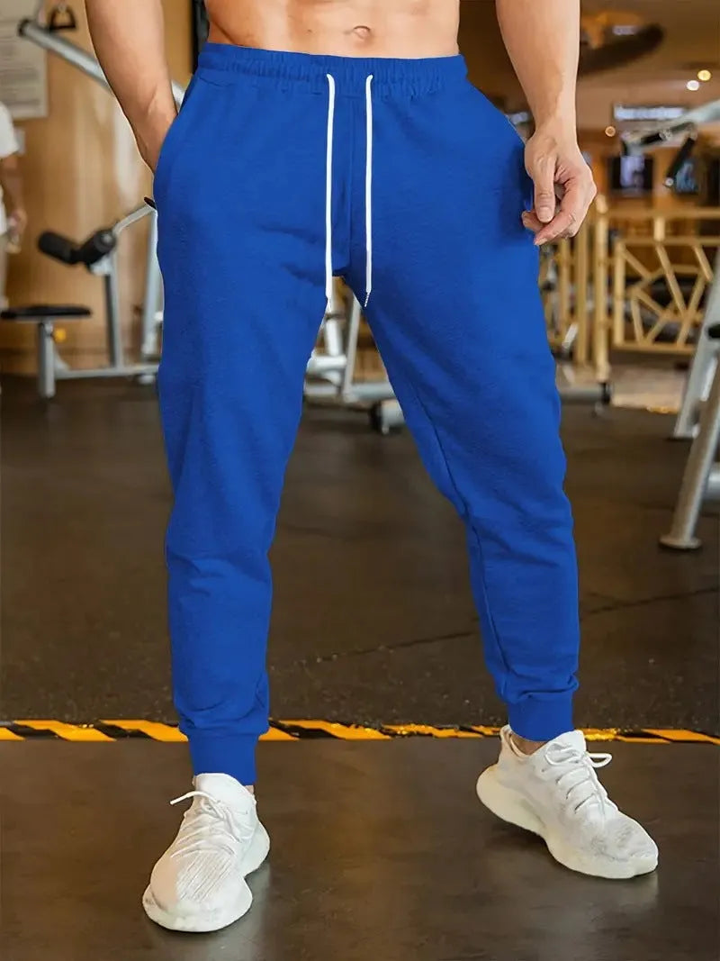 Men's linen-style trousers with elastic drawstring waist in loose fit design