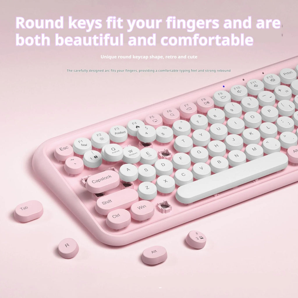 Pink wireless Bluetooth keyboard with 84 silent keys and compact portable design