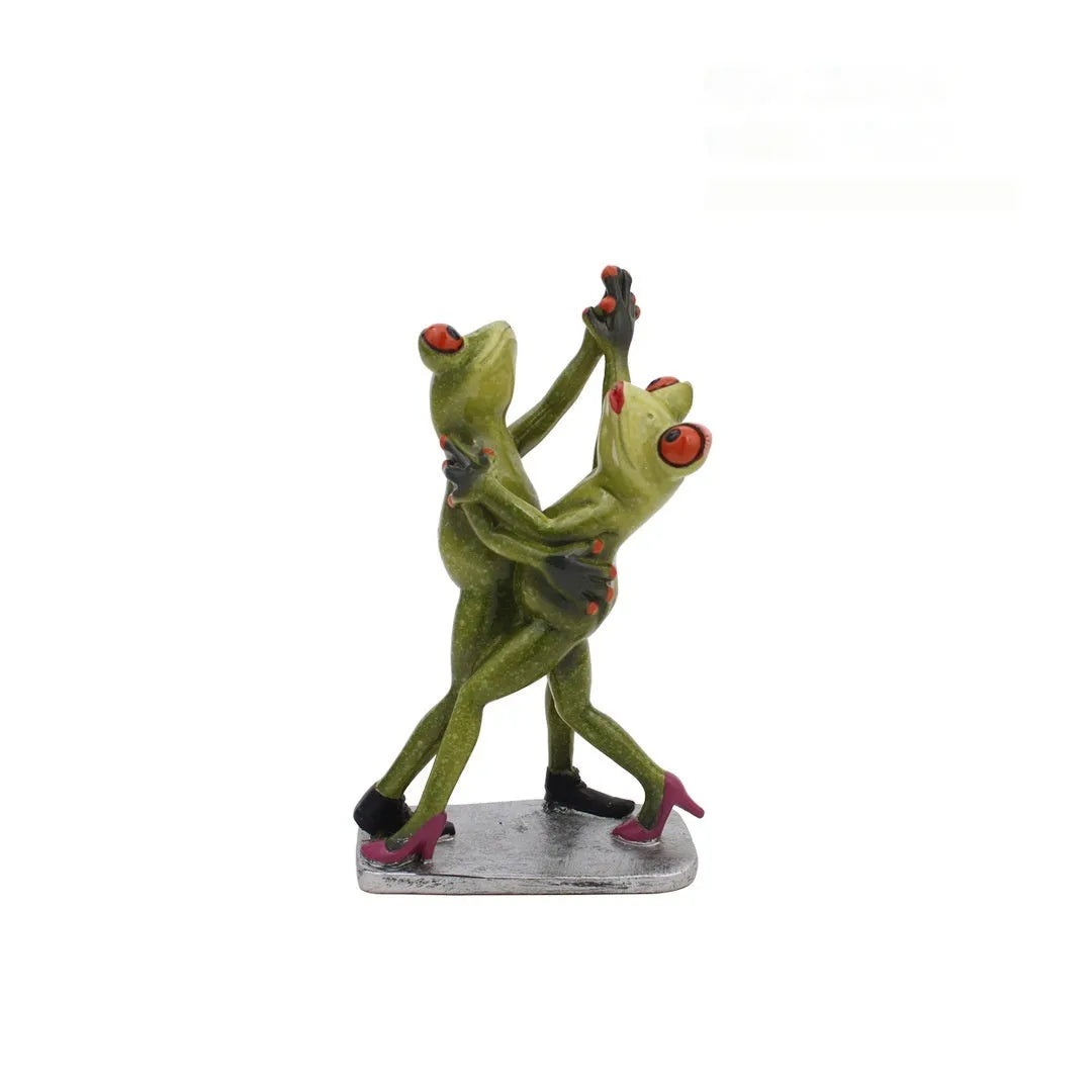 Pastoral style green resin frog decoration figurine on a wooden shelf.