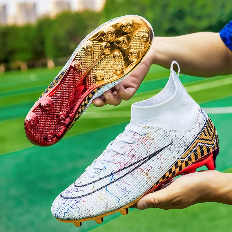 Men's white high-top synthetic leather soccer training shoes with gold plated sole on artificial grass.