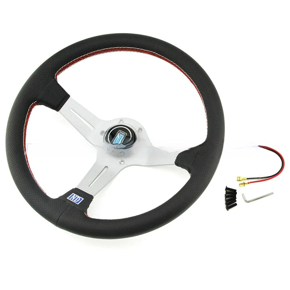 Black leather 14-inch steering wheel with deep concave dish and aluminium skeleton on a plain background.