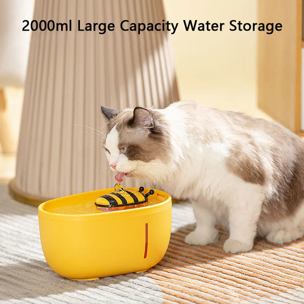 Yellow cat water fountain with filter system and blue LED light indicator