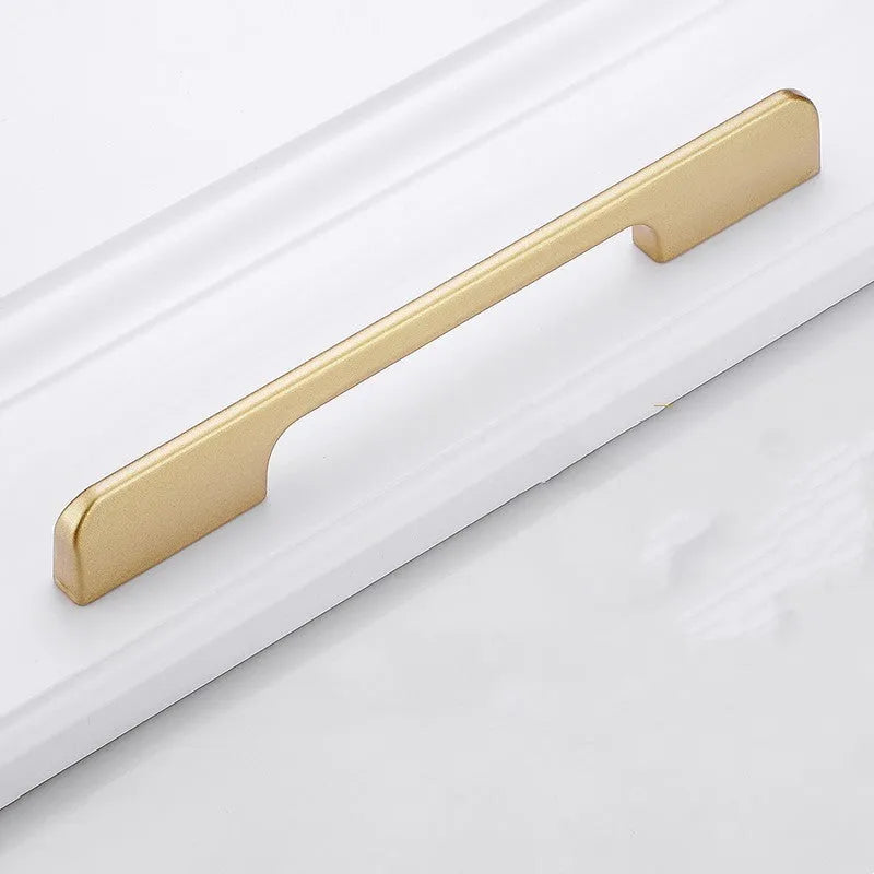 Brushed gold T-shape cabinet handle for single-hole furniture mounting.