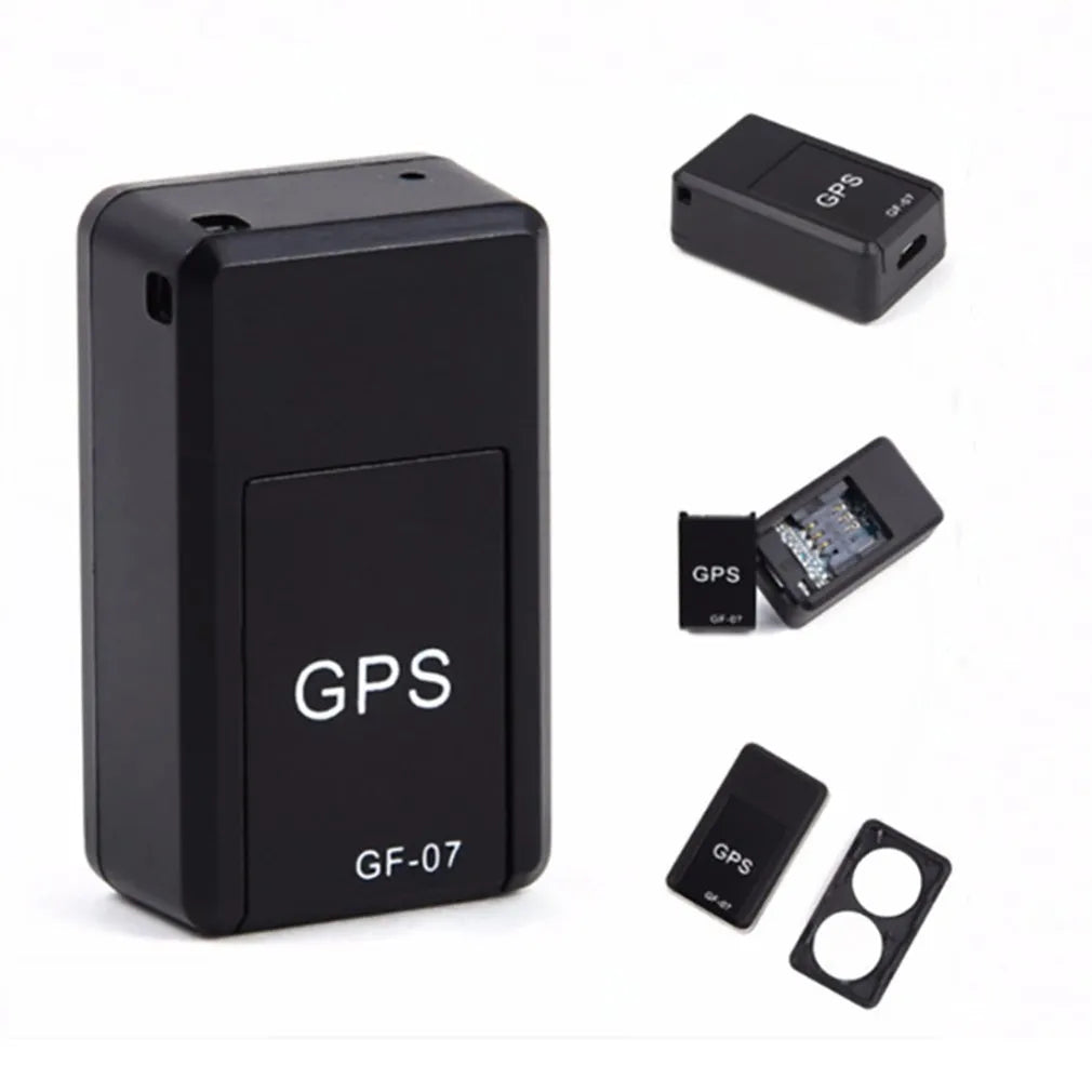 Small black magnetic GPS tracker device with USB cable for real-time vehicle and asset location tracking.