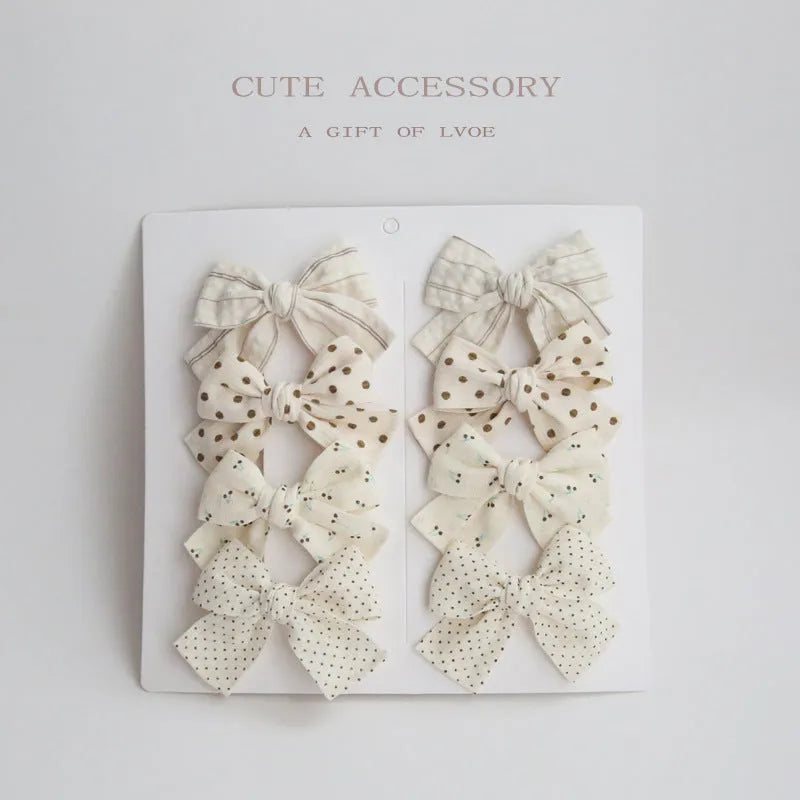 Children's fabric bow hair clips in dovetail shape with eight colour set options