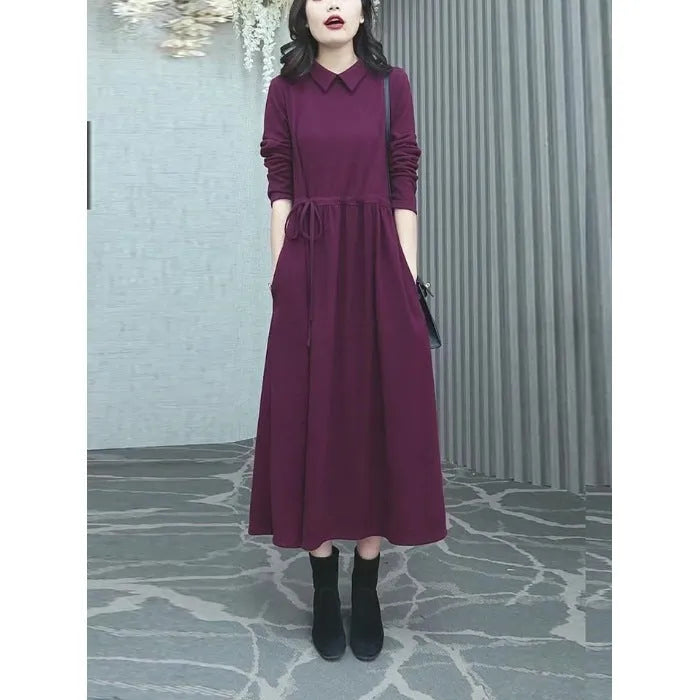 Purplish red long-sleeve maxi dress on a model, showing full-length 130-140cm skirt and urban style tailoring.
