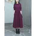 Purplish red long-sleeve maxi dress on a model, showing full-length 130-140cm skirt and urban style tailoring.