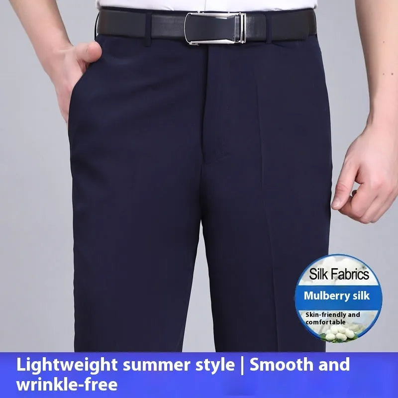 Men's dark blue straight-leg suit trousers with a high waist and non-iron finish on a hanger.
