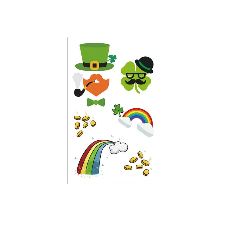 A single sheet of tattoo sticker paper featuring a green cartoon clover design for St. Patrick's Day, showing the water-transfer backing.