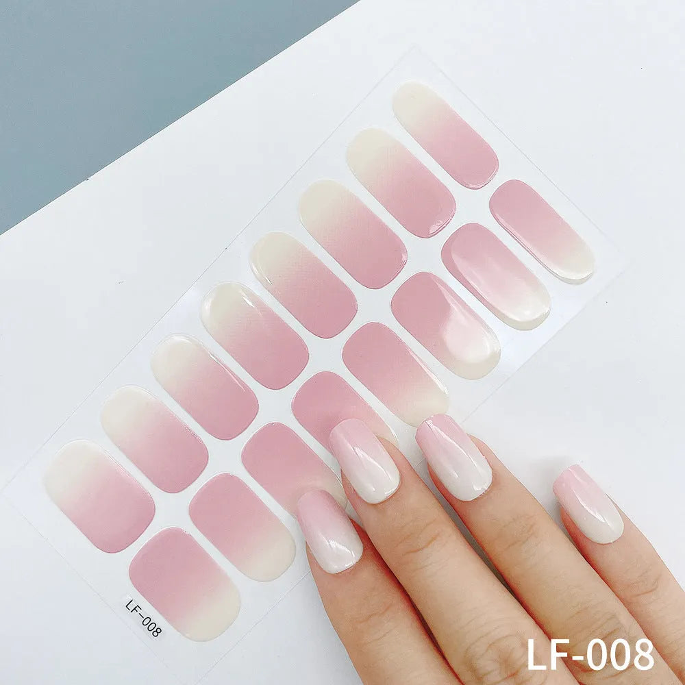 16 solid colour full nail art stickers with 22 patterns including cross, rose, butterfly designs in 12x6mm oval size