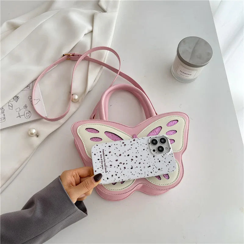 A white square crossbody bag for women with contrast colour details, showing its compact size and casual style.