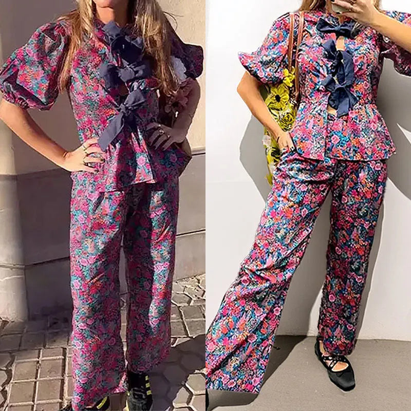 Women's floral print tie-neck long sleeve top with puff sleeves and matching trousers suit set