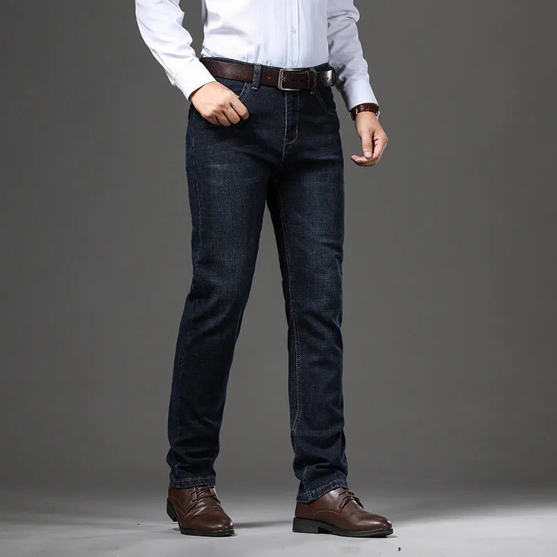 Loose fit straight-leg stretch jeans in black and blue denim colours on a hanger