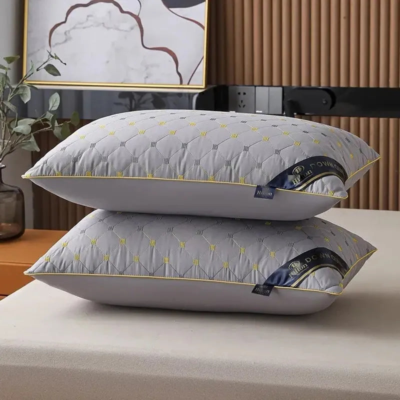 Polyester chemical fibre pillow core in light blue on a bed, showing its plump fill.