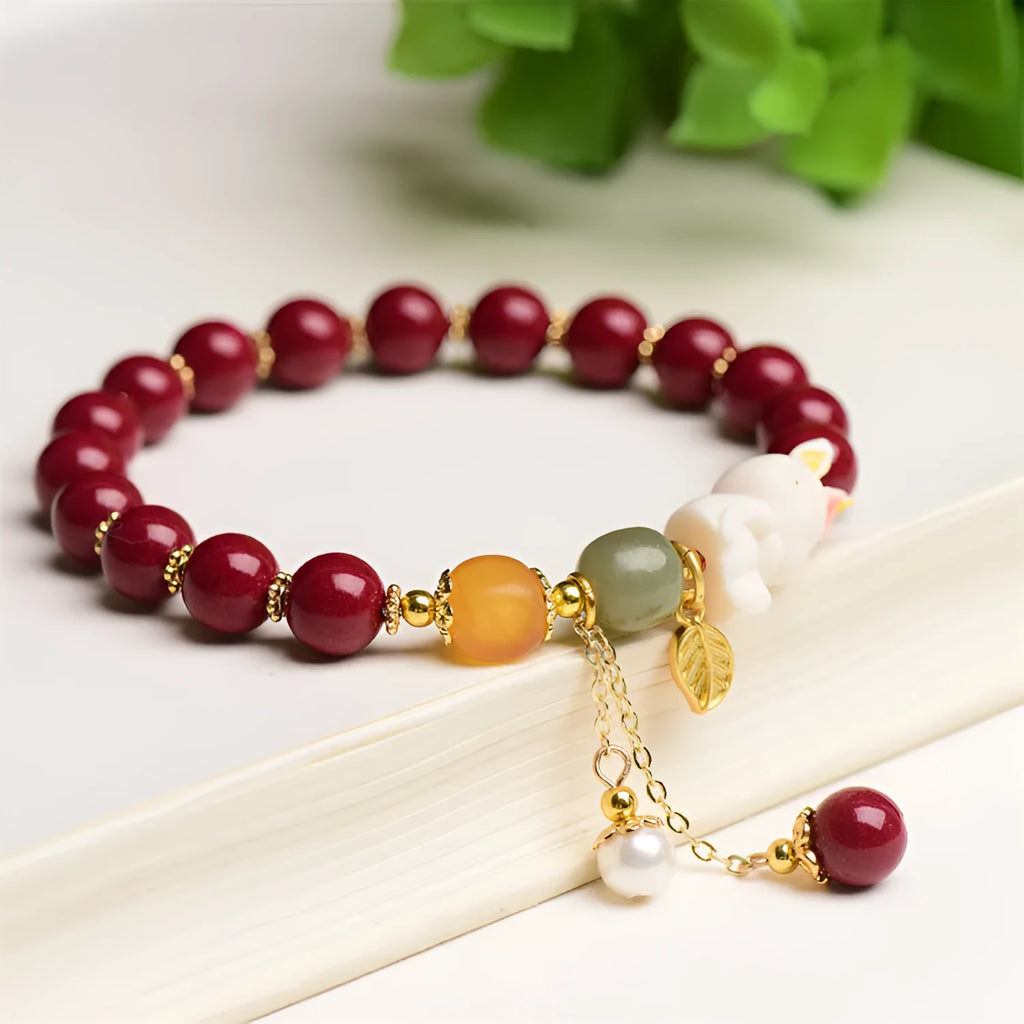 Traditional Chinese cinnabar bracelet with rabbit design in 8mm and 10mm bead size options.