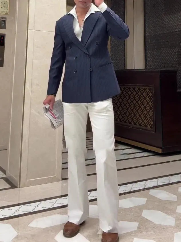 Men's classic striped double breasted blazer on a hanger