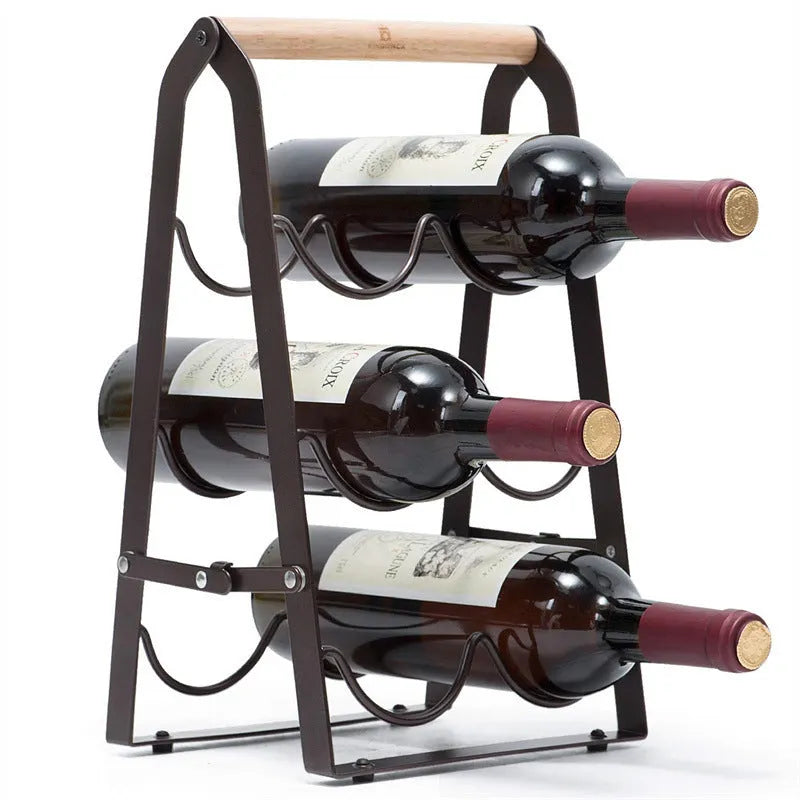 Iron desktop wine rack black with two wine bottles on kitchen countertop