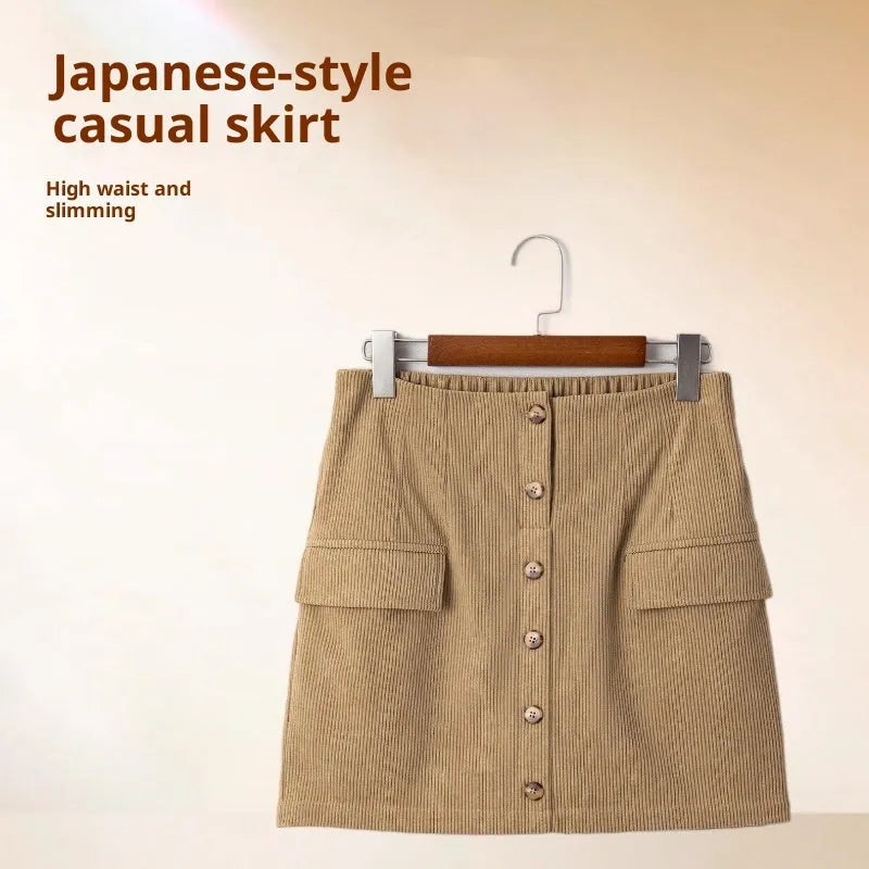 Women's corduroy hip skirt in coffee colour with sewn button detail, short street style skirt, sizes S to XL