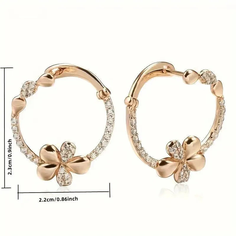 A pair of women's round geometric ring earrings in copper with an electroplated EK13286-FD-01 colour finish.