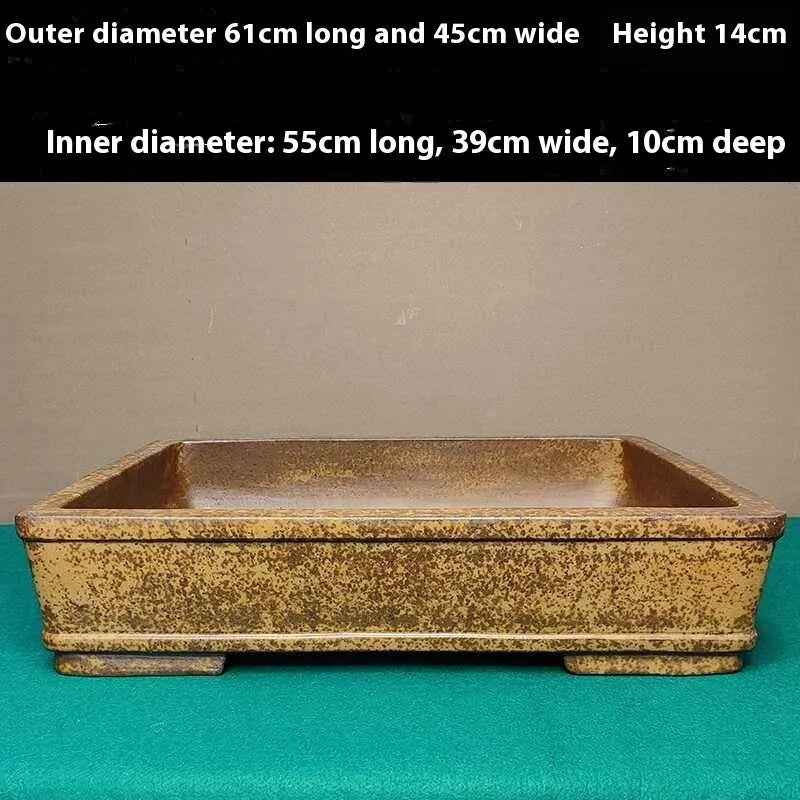 Straight-sided rectangular Yixing Zisha flowerpot in natural purple sand clay, shallow profile for plants.